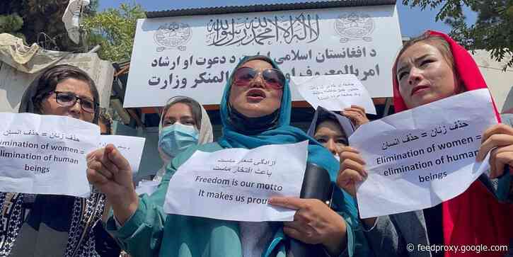 Afghan women protest their freedom outside the Taliban's virtue and vice ministry, which replaced the ministry of women's affairs