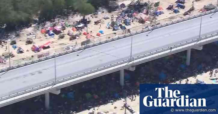 Aerial footage shows scale of makeshift migrant camp under Texas bridge – video