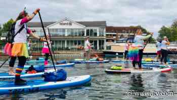 Paddleboarders complete River Thames marathon for charity - ITV News