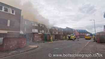 Fire service say west Belfast blaze started deliberately