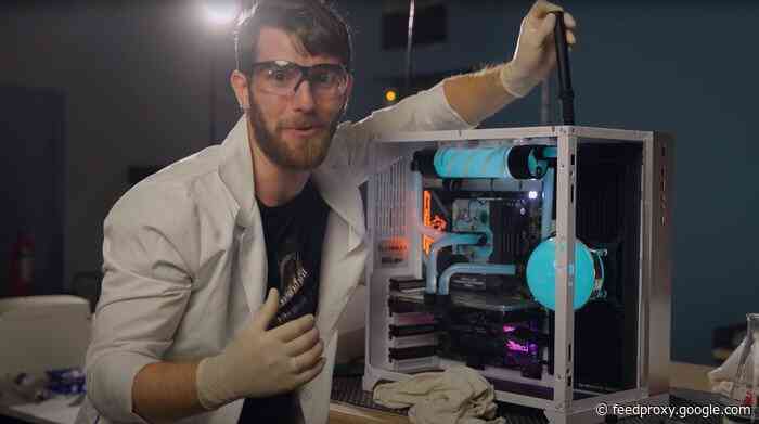 Amazing water cooled bioluminescent gaming PC glows in the dark