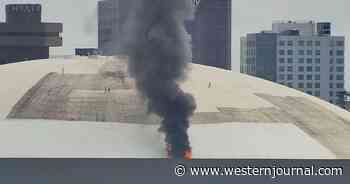 Emergency Vehicles Rush to NFL Stadium as Flames and Smoke Seen Emitting from Roof