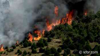 Oklahoma fire crews battle grass fire in Logan Co.