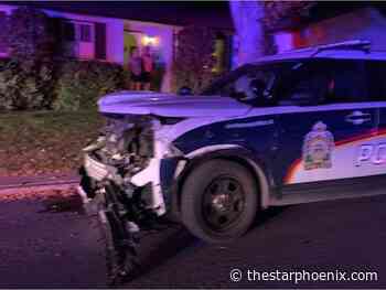 Saskatoon man charged after stolen vehicle hits police vehicles and house