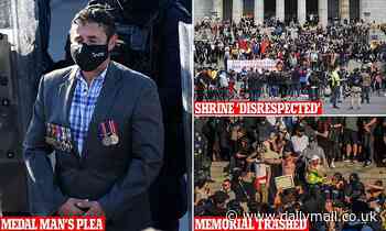 Solemn moment man wearing war medals tells violent protesters to 'respect' Shrine of Remembrance