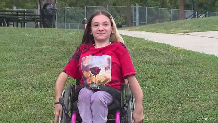 Cheerleader says she's been sidelined by high school because of her wheelchair