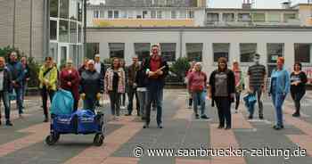 World Clean up Day Neunkirchen Rathaus - Mitarbeiter räumen auf - Saarbrücker Zeitung