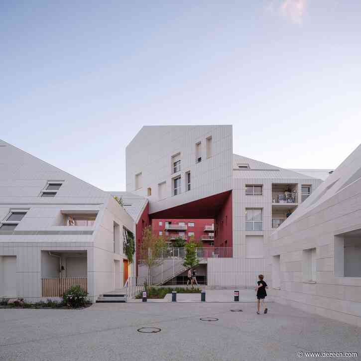 MVRDV slots red-walled courtyard into irregularly shaped French housing
