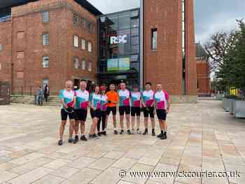 Warwick duo join cycling challenge to help raise thousands of pounds for charity in support of their colleague - Warwick Courier