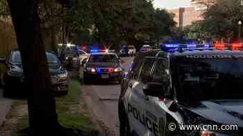 Houston police officer slain and another officer wounded while executing a warrant, mayor says. A possible suspect is dead - CNN
