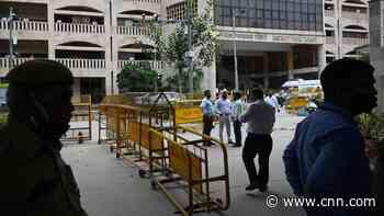 Murder defendant shot dead in Indian courtroom by gunmen dressed as lawyers