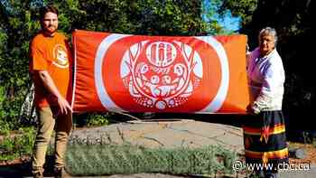 Flag to honour residential school survivors unveiled by National Centre for Truth and Reconciliation