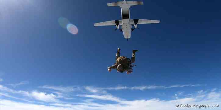 PHOTOS: Special operators and airborne soldiers put the US military's new sniper rifle of choice to the test by jumping out of airplanes with it