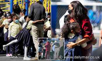 Don't they know there's pandemic? Meghan and Harry hug hoards of kids during visit to Harlem school