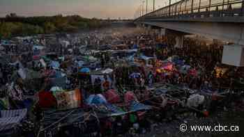 American political battle over immigration reaches a boiling point under a Texas bridge