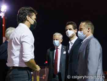 Michael Kovrig and Michael Spavor greeted by Trudeau in Calgary after detention in China - Calgary Herald