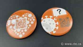 Doctor hopes buttons worn by health care workers will encourage vaccination in Toronto shelters