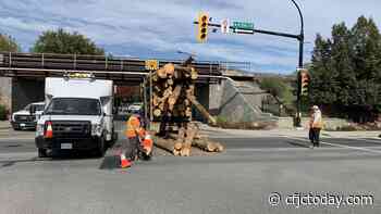PHOTOS: Logging truck wedged beneath downtown rail overpass - CFJC Today Kamloops
