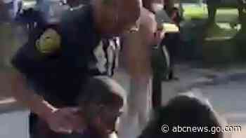 WATCH:  Police officer walks nervous boy into his 1st day of school
