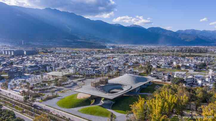 Curving roof incorporates seating at Yang Liping Performing Arts Center