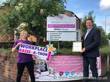 Firm signs up to become a valuable hospice patron - The Bolton News