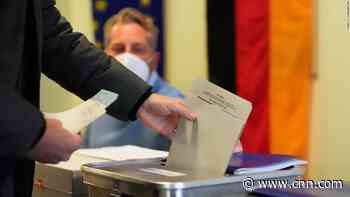 Left-leaning SPD narrowly ahead in exit polls