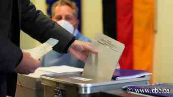 Early German exit polls show Merkel's centre-right bloc on track for worst-ever result