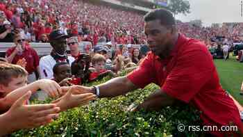 Herschel Walker is often seen and seldom heard as Senate campaign gets rolling