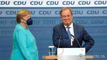 German Social Democrats narrowly beat Merkel's centre-right bloc in elections