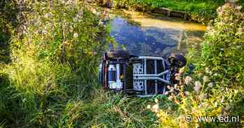 Man met scootmobiel belandt in gracht, omstanders halen hem uit water - Eindhovens Dagblad