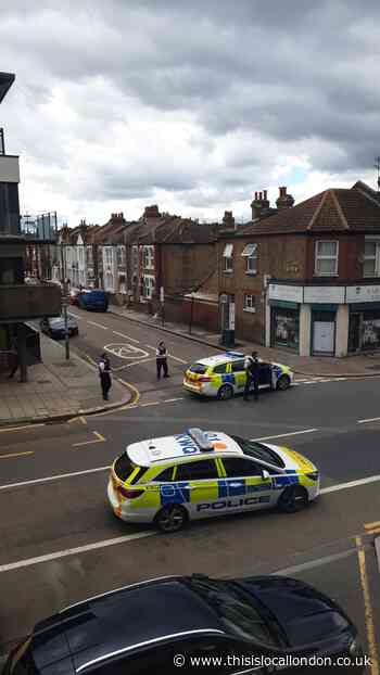 Police swarm Garratt Lane in Tooting after three 'gunshots'