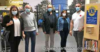 Lions Club Neunkirchen sammelt Spenden - Secondhand Bücher im Supermarkt - Saarbrücker Zeitung