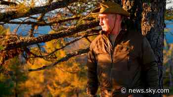 Vladimir Putin pictured fishing and hiking on Siberian forest holiday - Sky News