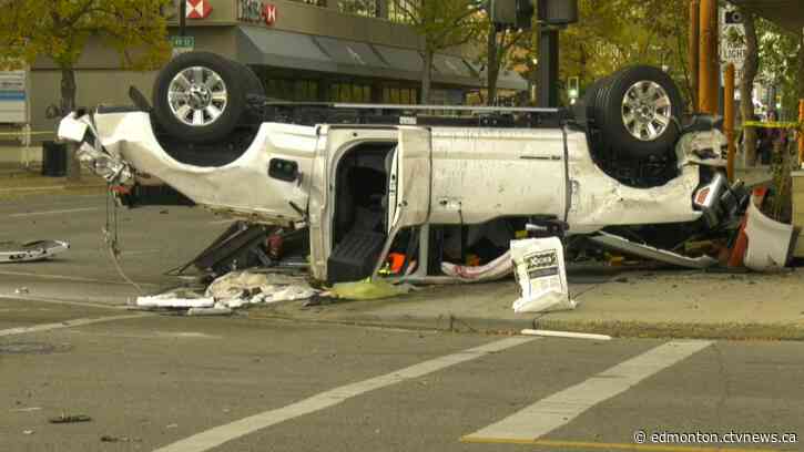 Central Alberta armed carjackings, police pursuit end in fiery crash