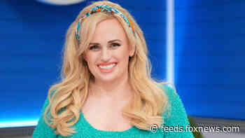 Rebel Wilson tells fans 'it’s never too late to improve yourself' while posing in red hot swimsuit