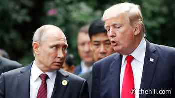 Former aide says Trump told Putin at summit he was going to act tougher 'for the cameras'