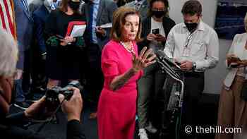 Pelosi invokes climate conference in spending push