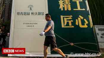 Evergrande: Struggling firm to raise $1.5bn as debt payment looms