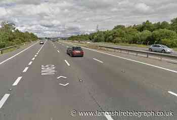 Section of M65 closed as vehicle overturns