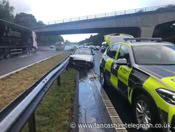 Warning as motorist smashes into M6 central reservation after losing control in heavy rain
