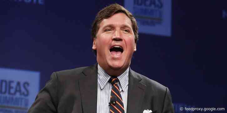 Fox News host Tucker Carlson called a CNN reporter a 'midget with the microphone'