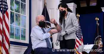 Twitter Users Notice Massive Strange Detail Behind Biden in Photo of Him Getting Booster Shot