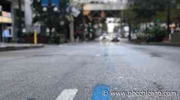 What Blue Line Painted on City Streets Means For Chicago Marathon Runners - NBC Chicago