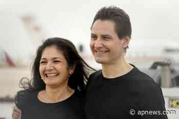 Libres canadienses y ejecutiva china en intercambio presos - AP News