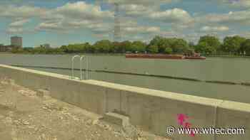 City marks completion of new river wall in Corn Hill