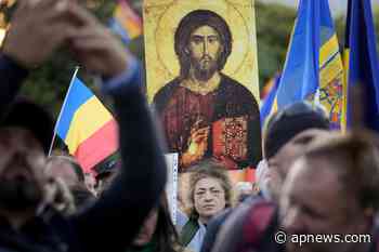 Protesters in Romania reject coronavirus restrictions - Associated Press