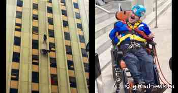 Hamilton-area man to rappel down Toronto high rise in his wheelchair — and for the fourth time - Global News