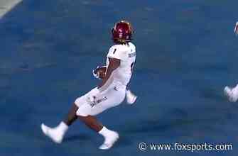 DeaMonte Trayanum rushes into end zone for a six-yard touchdown bringing Arizona State to a tie with UCLA, 10-10