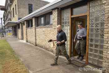 Flag-wearing man throws Molotov cocktail into Austin Dems HQ - Associated Press