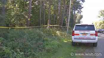 Law enforcement officers searching Rails-to-Trails system after discoveries of human remains